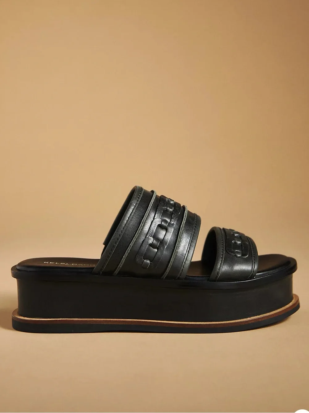 Kelsi Dagger Brooklyn Drift platform slide sandals in black leather featuring 7